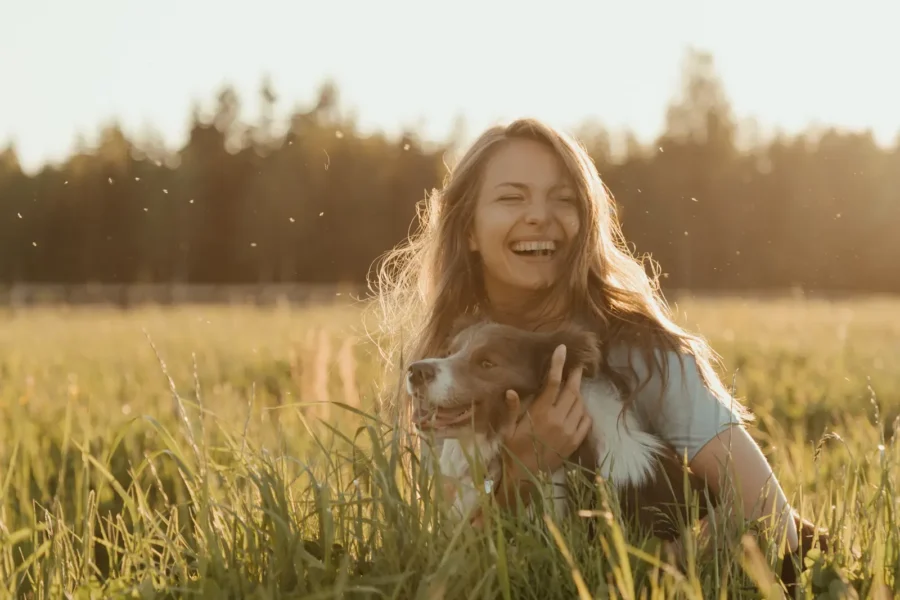 5 Reasons Why Having A Dog Pet Will Ameliorate Your Quality Of Life 20 Happy owner with their dog — 5 reasons a dog improves your quality of life
